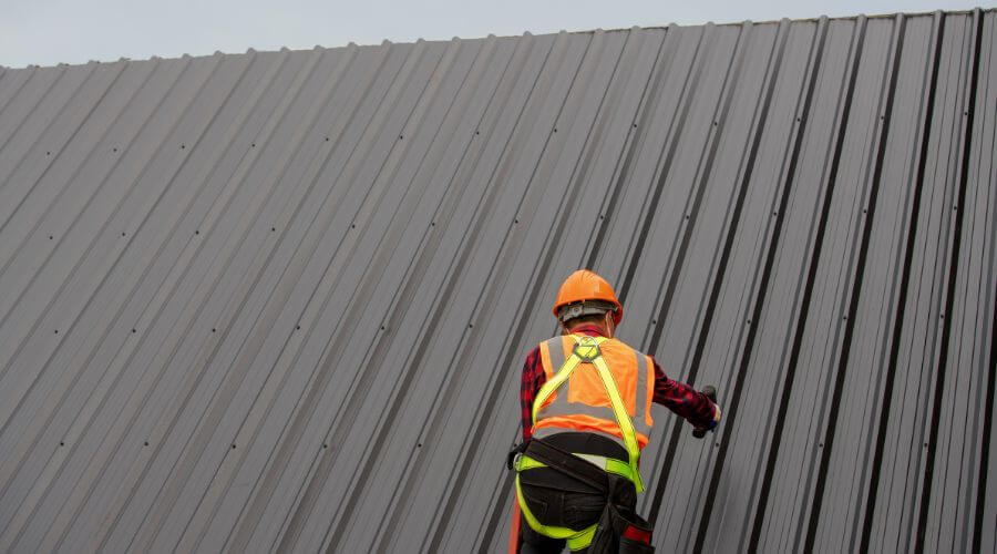 Expert tile roof repair services in Plessis, NY
